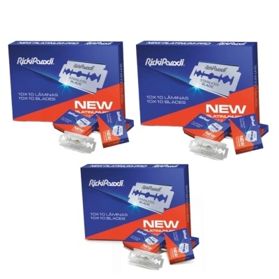 Caixas de lâminas de barbear RickiPiccoli azul e vermelho com texto NEW PLATINUM BLADES