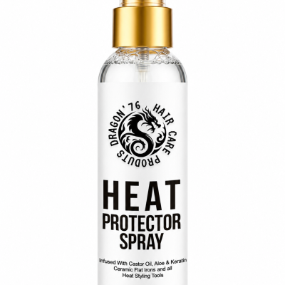 Frasco de spray de proteção térmica para cabelo com tampa dourada e rótulo branco e preto.