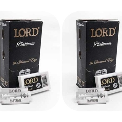 Embalagens pretas e brancas de lâminas de barbear LORD Platinum, com lâminas expostas