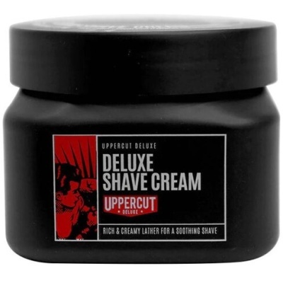 Pote preto de creme de barbear Uppercut Deluxe com rótulo preto, branco e vermelho
