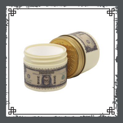 Frasco de creme branco com tampa dourada e rótulo de nota de 100 dólares