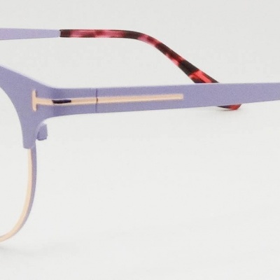 Óculos com armação metálica lilás e dourada, lentes redondas
