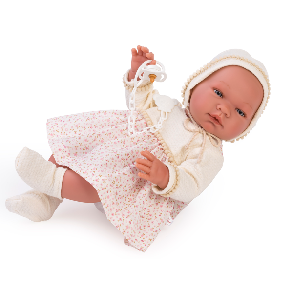 Boneca bebé com vestido branco estampado e chupeta branca