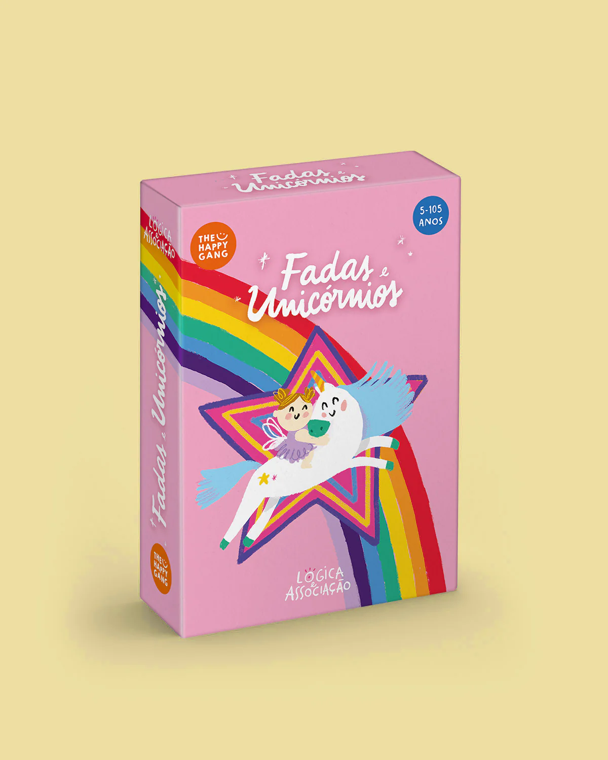Embalagem rosa com jogo educativo Fadas e Unicórnios com ilustração de unicórnio e fada e texto em português.