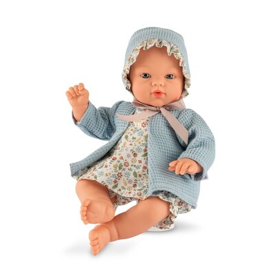 Boneca de bebé com roupa azul e floral