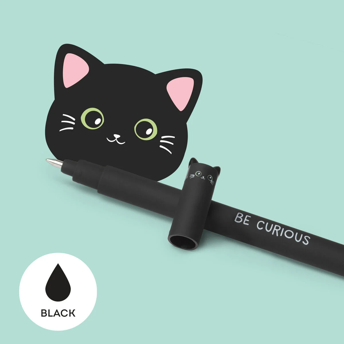 Caneta preta com tampa em forma de gato e texto 'BE CURIOUS'