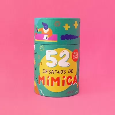 Caixa cilíndrica colorida com desafios de mímica e fundo rosa.