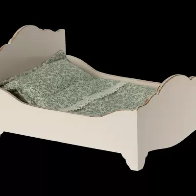Cama pequena de madeira com roupa de cama floral verde e branca