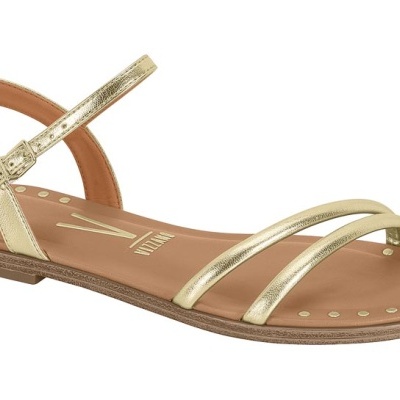 Sandália dourada de tiras finas com sola castanha e fivela ajustável