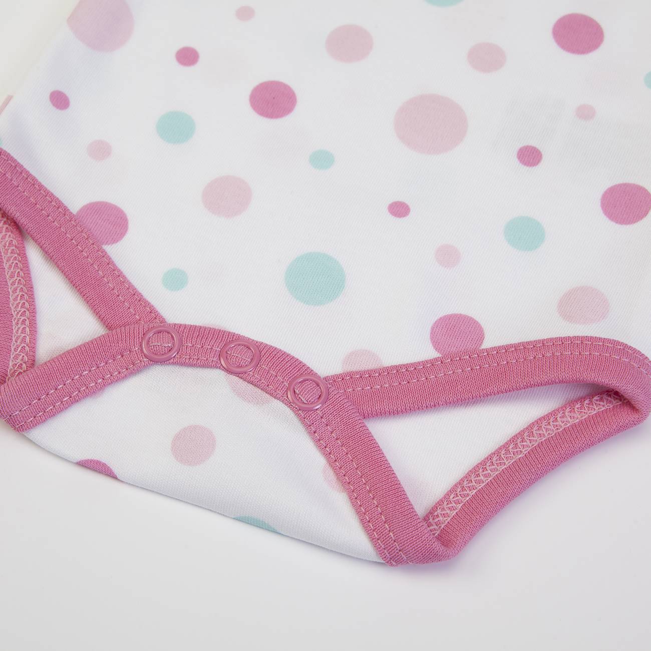 Body de bebé com bolinhas e fecho de molas cor-de-rosa