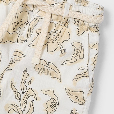 Calças com padrão floral bege e preto com cordão trançado