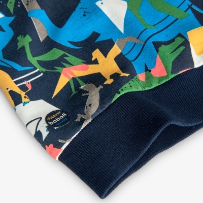 Manga de peça de roupa com estampado de dinossauros e etiqueta NEXOXY BABOLAT