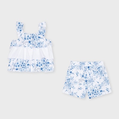 Conjunto infantil menina top e calções brancos com padrão floral azul