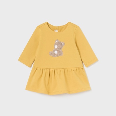 Vestido amarelo de criança com ursinho aplicado