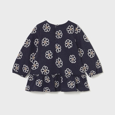 Blusa infantil azul escura com flores brancas e rosa e folho na base