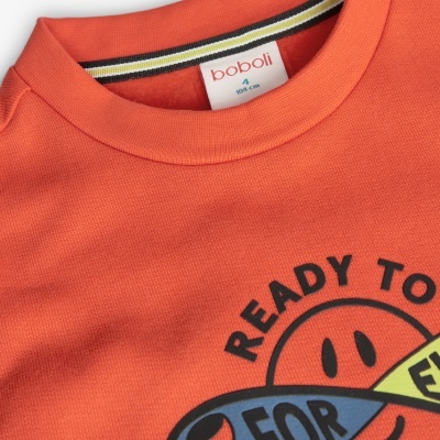 Camisola de criança laranja com estampado colorido e etiqueta boboli