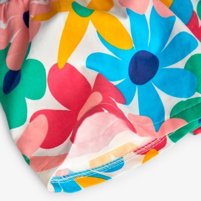 Tecido com padrão colorido de flores grandes