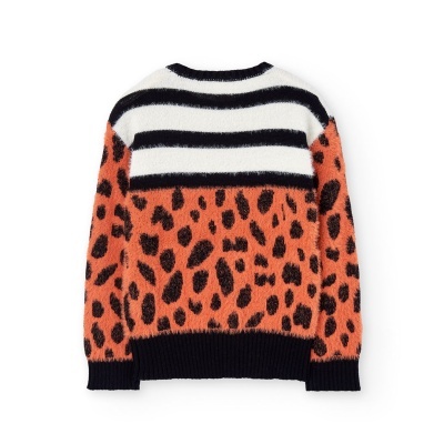 Camisola felpuda riscas pretas e brancas e manchas pretas sobre fundo laranja