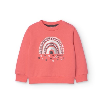 Sweatshirt coral com padrão de arco-íris de círculos.