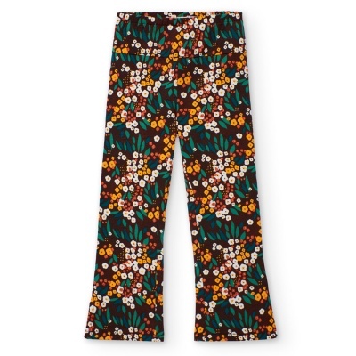 Calças com padrão floral colorido em fundo preto.