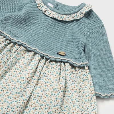 Vestido bebé azul turquesa com saia branca padrão pintas azuis castanhas cinzentas