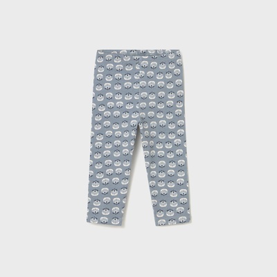 Calças de criança azuis com padrão de carinhas brancas sorridentes