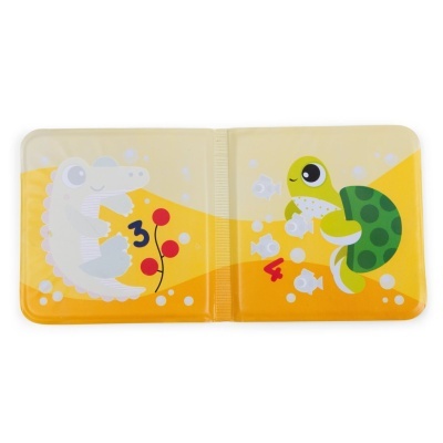 Livro de banho colorido com crocodilo branco, tartaruga verde e peixes em fundo amarelo.