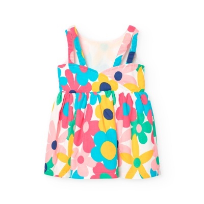 Vestido infantil colorido com padrão floral e tirantes largos