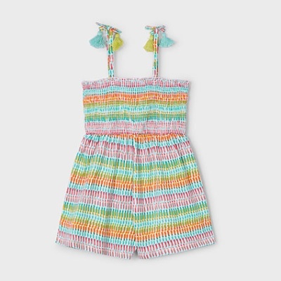 Macacão colorido com padrão xadrez multicolor e alças com pompons