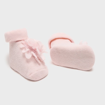 Meias cor-de-rosa para bebé com flor decorativa