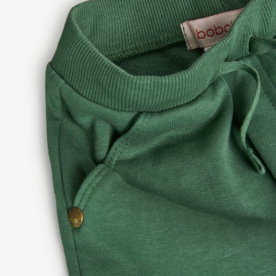 Calças verdes de algodão com cordão de cintura e bolso com rebite