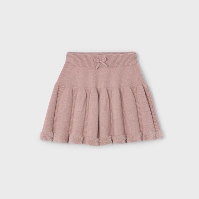 Saia infantil rosa em malha texturizada com laço e pompons.