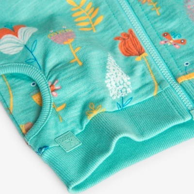 Casaco de criança azul turquesa com estampado floral e fecho de correr