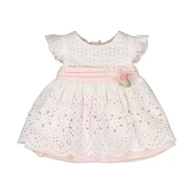 vestido infantil branco com detalhes rosa e padrão floral recortado