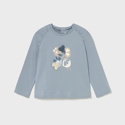 Camisola azul clara de manga comprida com desenho floral no centro