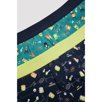 Cuecas coloridas com estampados de desenhos animados e cintas elásticas coloridas.