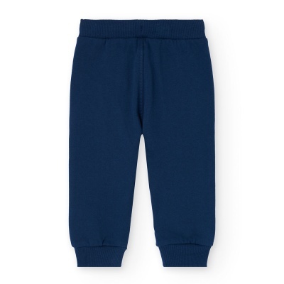 Calças azuis escuras para criança com cós elástico e punhos canelados.