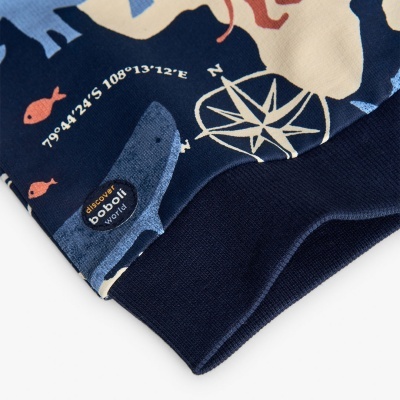 Tecido estampado azul e bege com padrão marítimo e etiqueta boboli