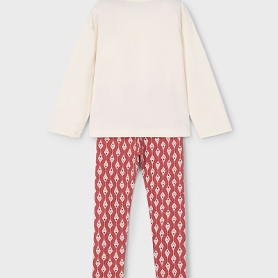 Conjunto infantil com camisola creme e calças vermelhas com padrão branco