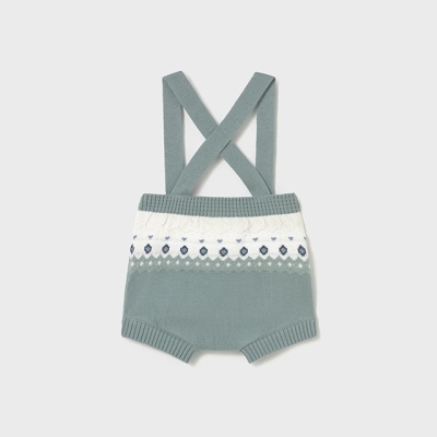 Macacão de malha azul esverdeado com padrão branco e azul e alças cruzadas