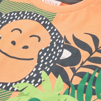 T-shirt laranja com estampa de macaco sorridente e folhas, etiqueta Boboli na gola.