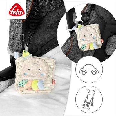 Brinquedo macio com figura de polvo preso a carrinho com argola transparente