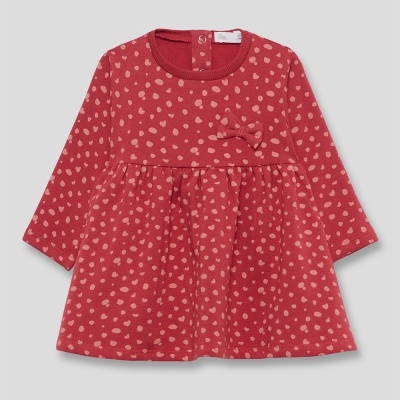 Vestido infantil vermelho com manchas cor de rosa e laço no peito