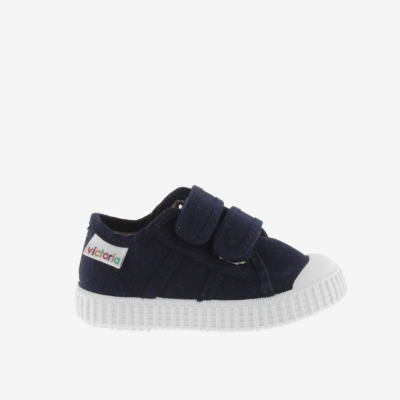 Ténis infantis azul escuro com sola branca e fecho de velcro