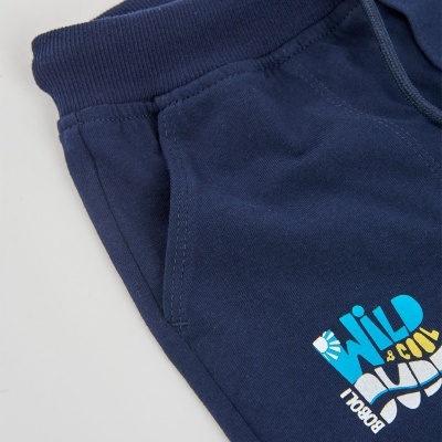 Calças de tecido azul escuro com bolso e estampado colorido