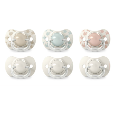 Seis chupetas de bebé em várias cores e padrões