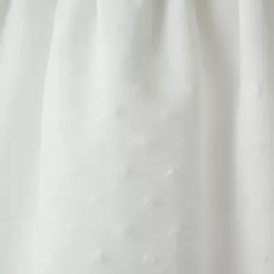 tecido branco com textura em relevo de pequenos pontos