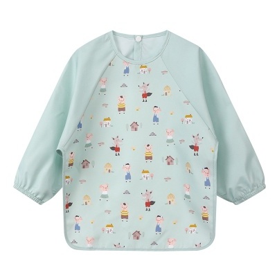 Babete impermeável verde água com personagens dos Três Porquinhos