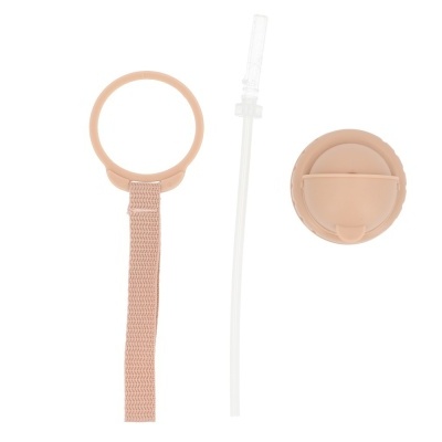 Conjunto de peças plásticas e tecido rosa com tubo transparente