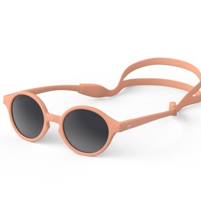 Óculos de sol infantis cor de pêssego com lentes redondas escuras e tira ajustável